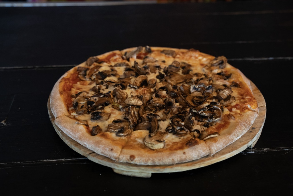 Mitad de Pizza  de  Champiñones D
